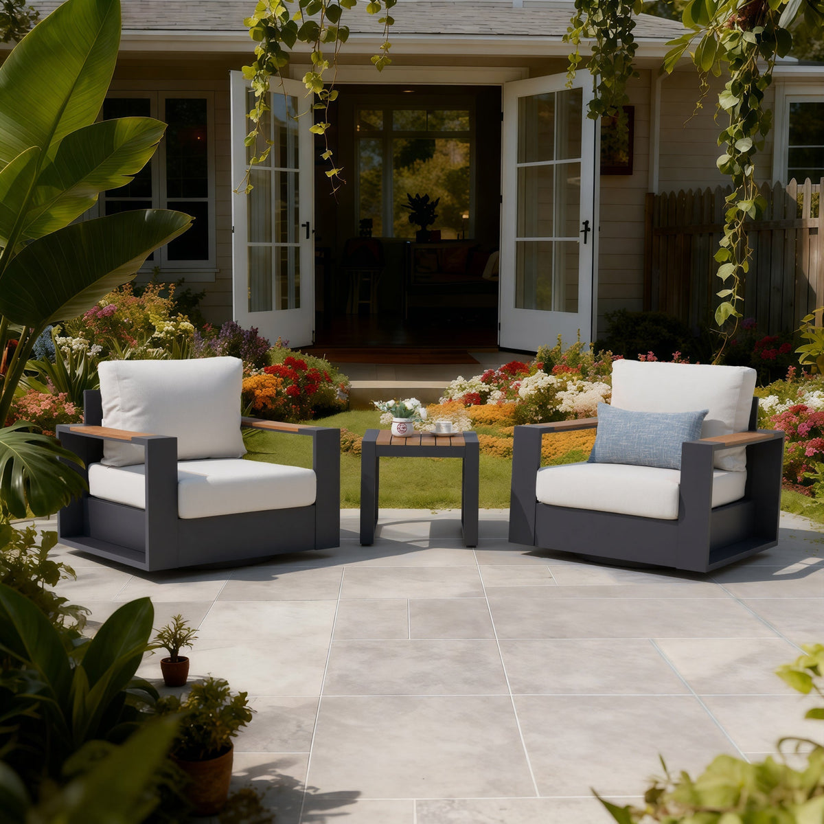 aluminum swivel Outdoor patio furniture set on a tiled patio in front of a house